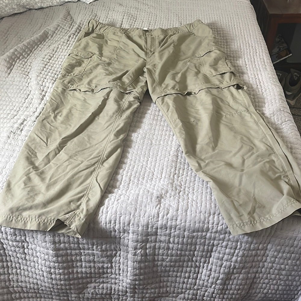 REI outdoor pants transforms into shorts. Great condition worn once.